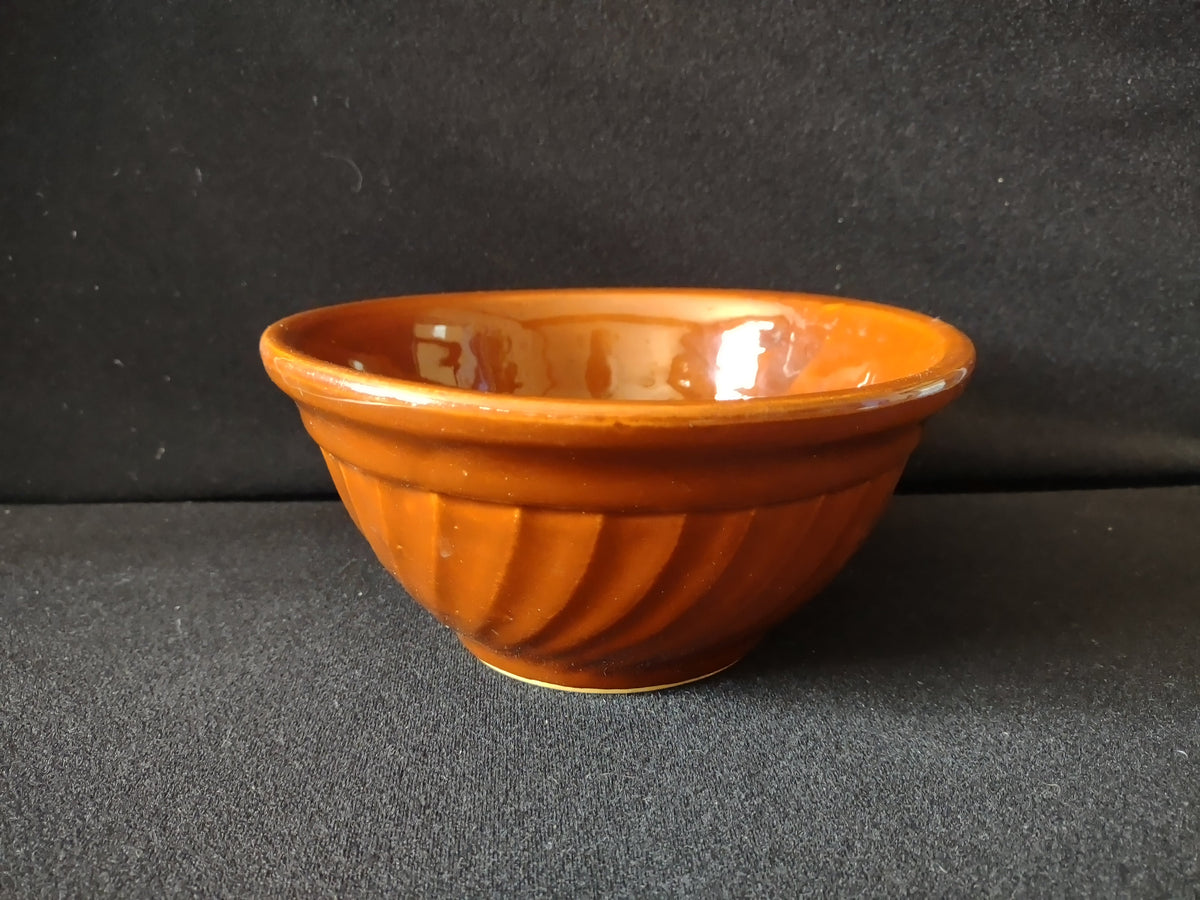 Vintage Hull Pottery mixing bowl exterior swirl ribbed pattern close-up