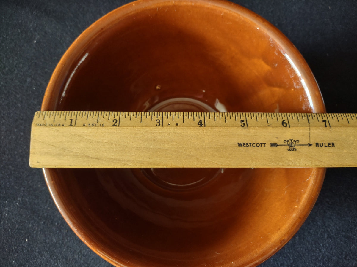 Vintage Hull Pottery mixing bowl exterior swirl ribbed pattern close-up angle 2
