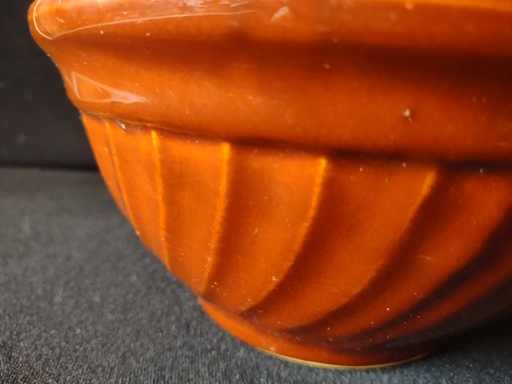 Vintage Hull Pottery mixing bowl interior showing surface scratches and discoloration