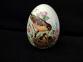 Avon Collectibles porcelain egg with ruler showing approximately 3 inches tall