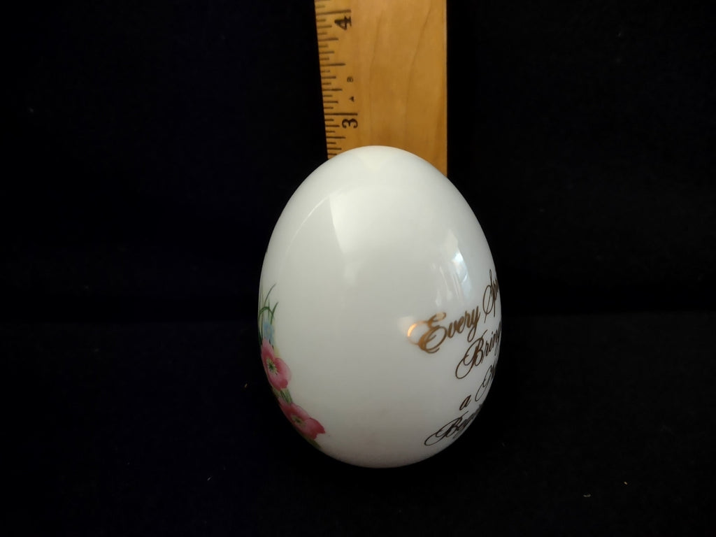 Avon Collectibles porcelain egg Every Spring Brings a New Beginning gold script side view