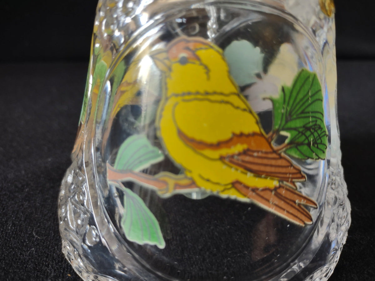 Close-up of cut crystal neck and upper bell body with hobstar pattern