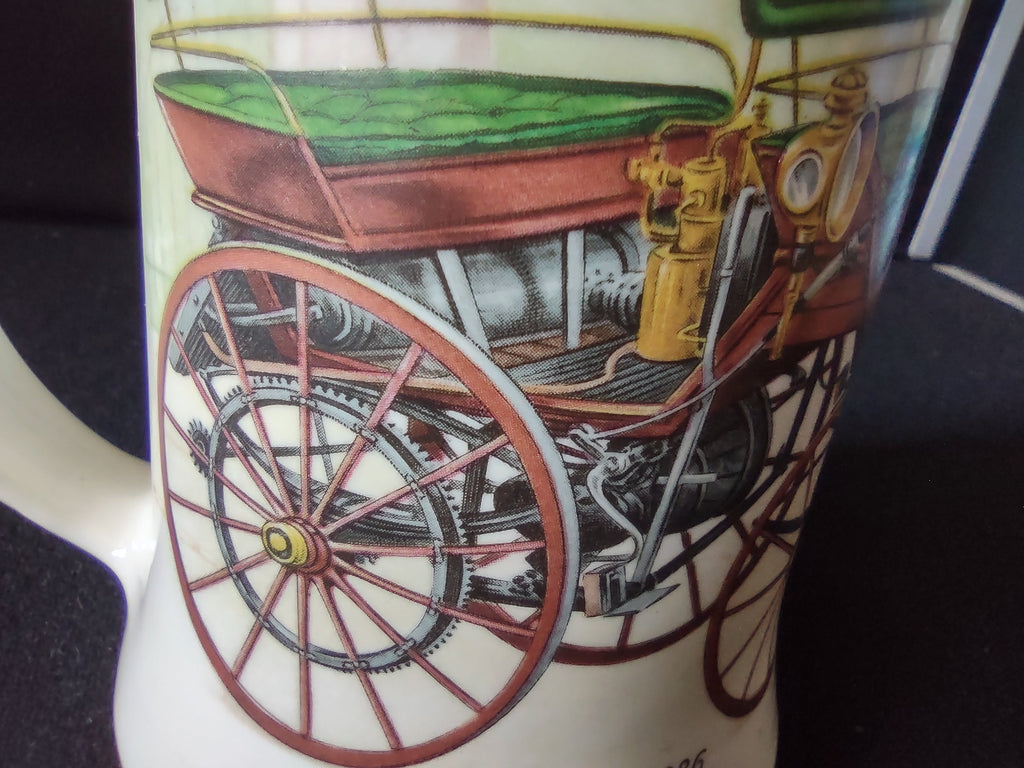 Bottom view of off-white ceramic stein showing unglazed foot ring with age discoloration