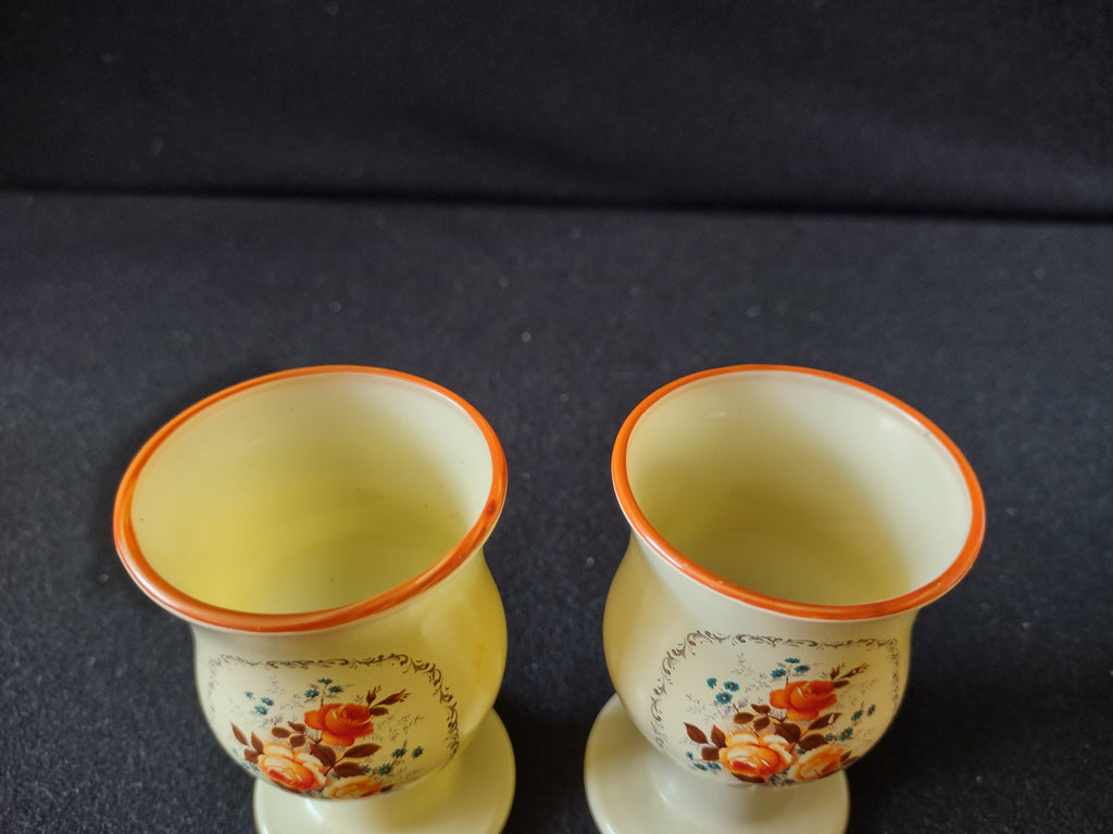 Top view of frosted glass goblet showing orange rim band