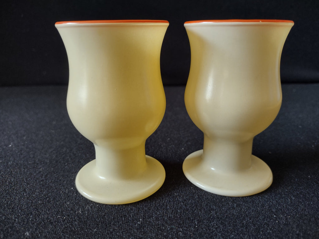 Side view of frosted glass goblet set on dark background