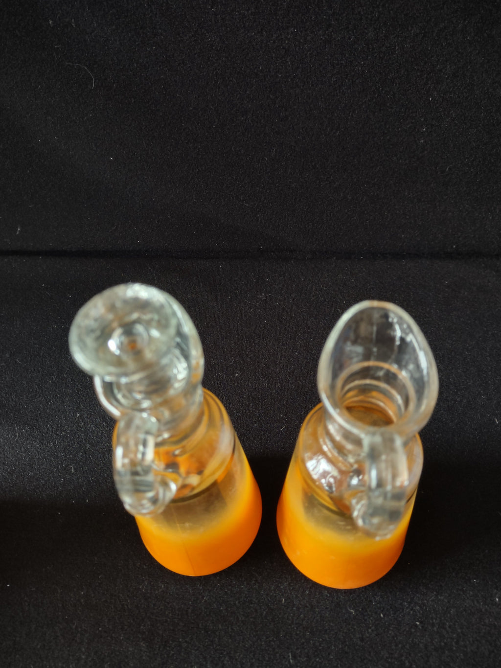 Salt and pepper shakers with silver dome lids - front view