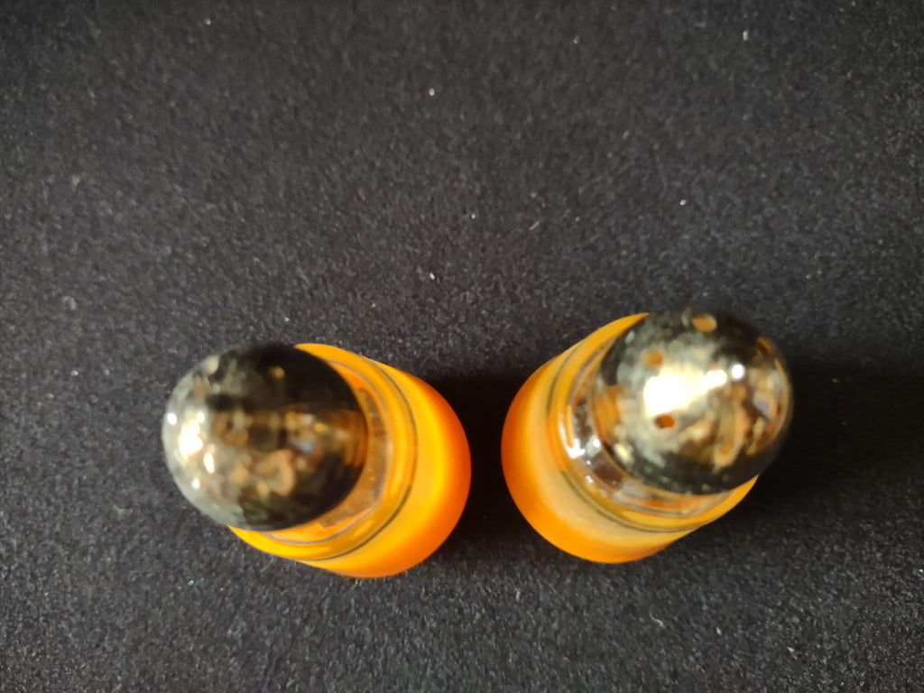Close-up of cruet handle and spout detail