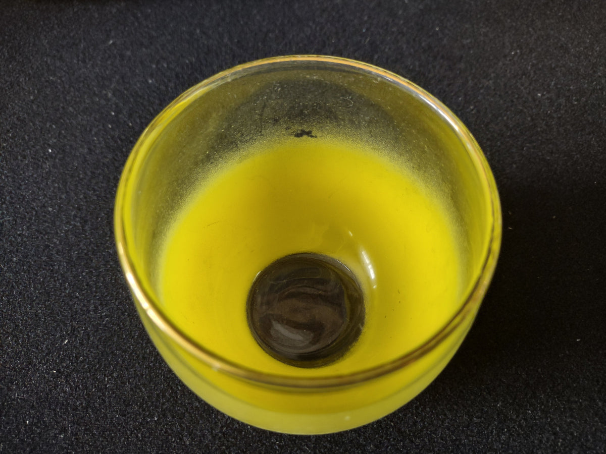 Vintage yellow frosted roly-poly tumbler approximately 2.5 inches tall with gold rim