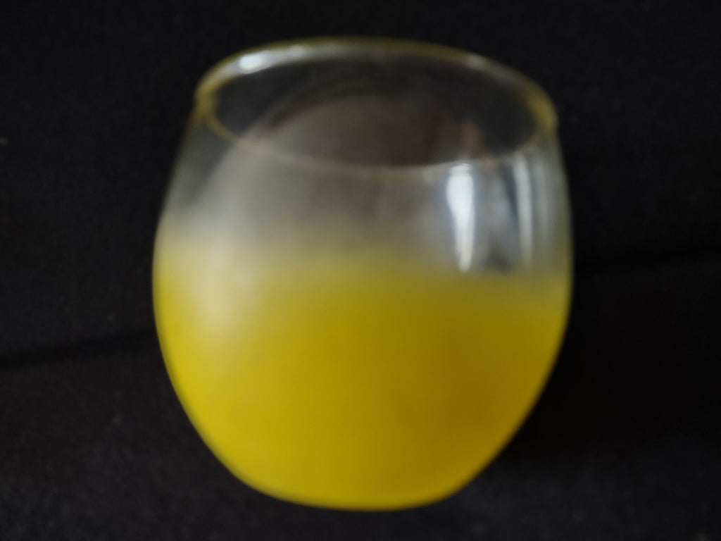 Vintage yellow frosted roly-poly tumbler side view with ruler showing 2.5 inch height