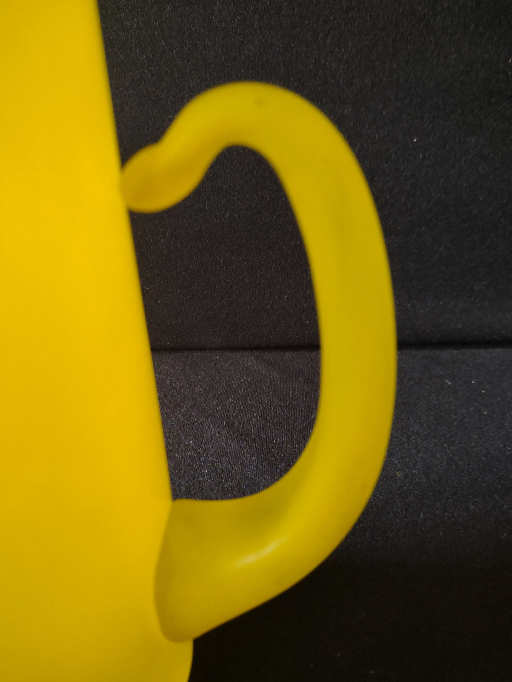 Vintage yellow frosted roly-poly tumbler top-down interior view
