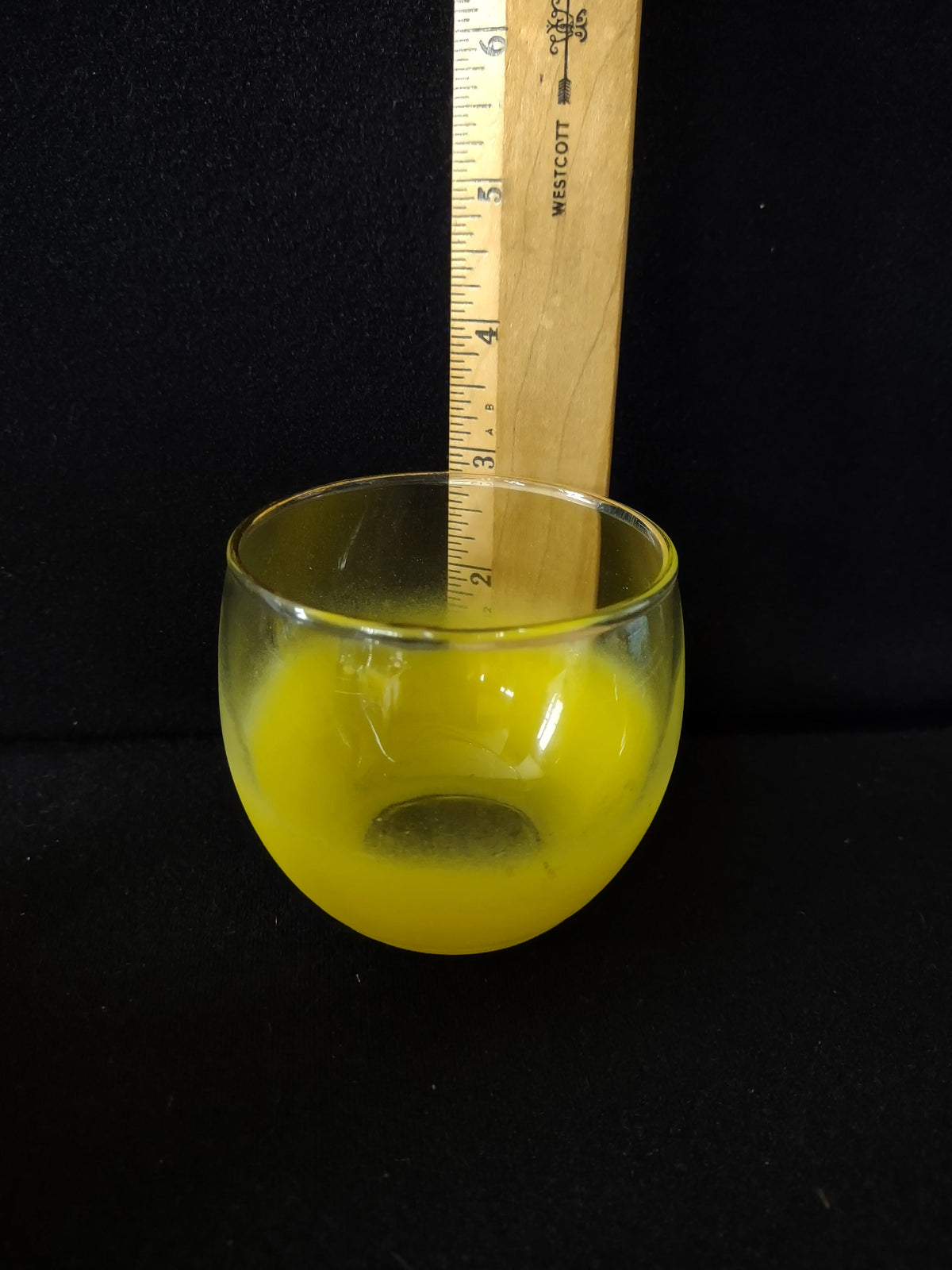 Vintage yellow frosted roly-poly tumbler top view showing interior and gold rim