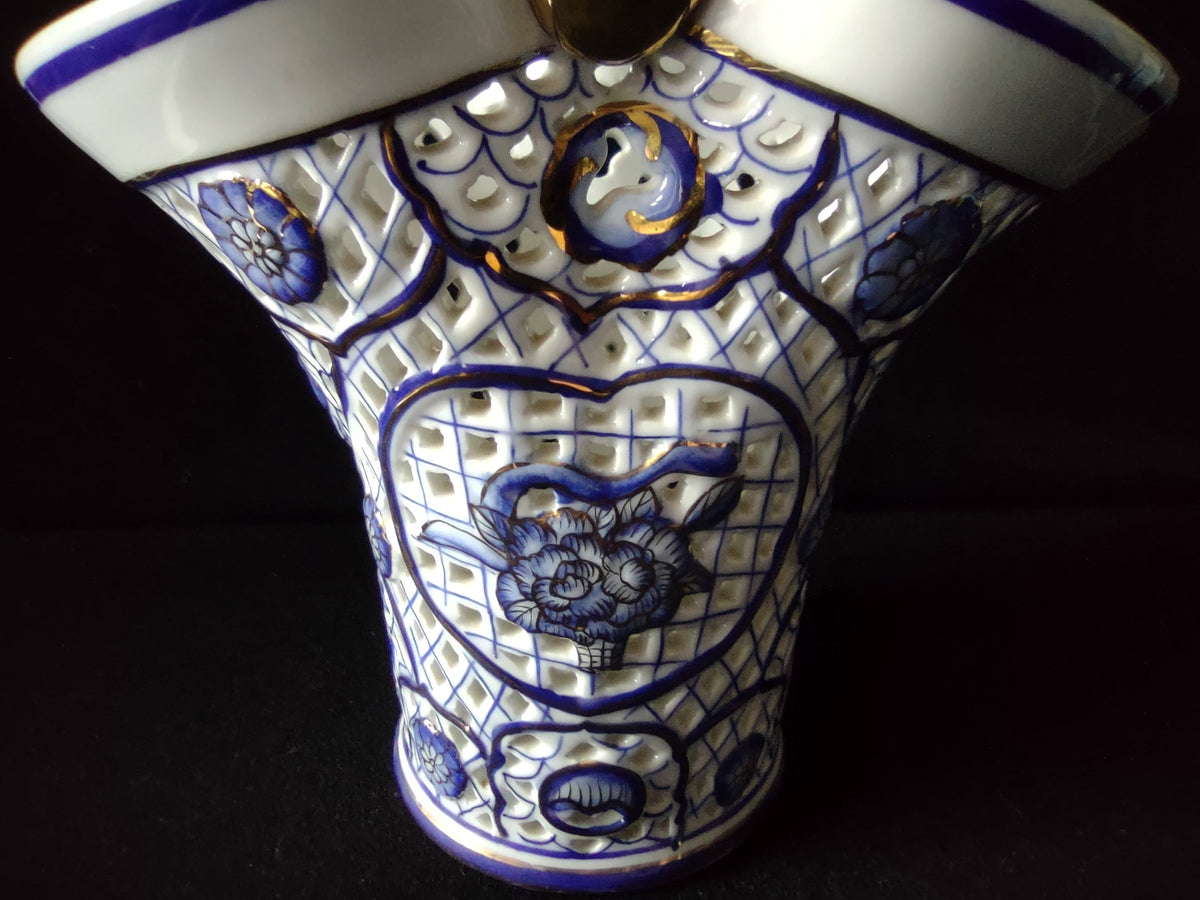 Vintage Hand Painted Fine Porcelain Blue Gold Reticulated Basket - close-up of gold-accented twisted rope handle