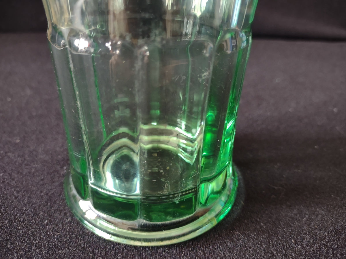 Vintage Coca-Cola green glass tumbler - close-up of stepped base showing mineral deposits
