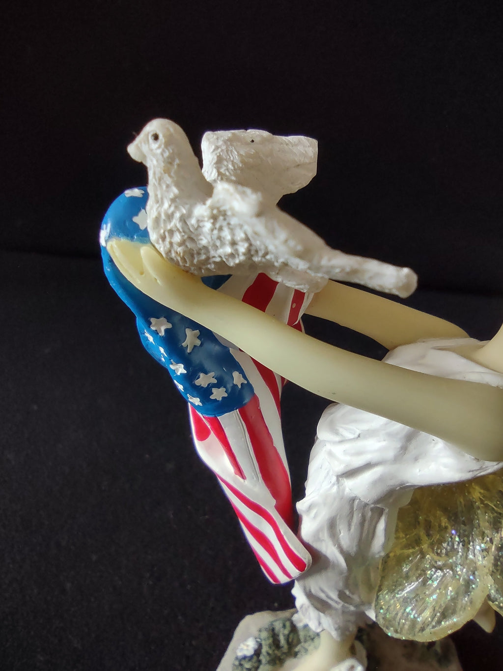 Vintage Dezine Friends of Peace angel fairy figurine - side view showing wing and flag detail