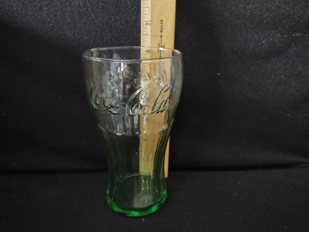 Single Coca-Cola green glass tumbler with ruler showing approximately 6 inch height
