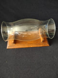 Top view of wood cradle stand showing two curved saddle supports