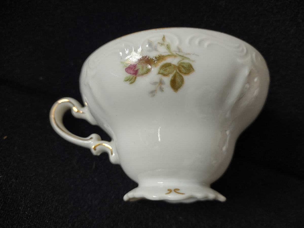 Close-up of cup base and gold trim detail