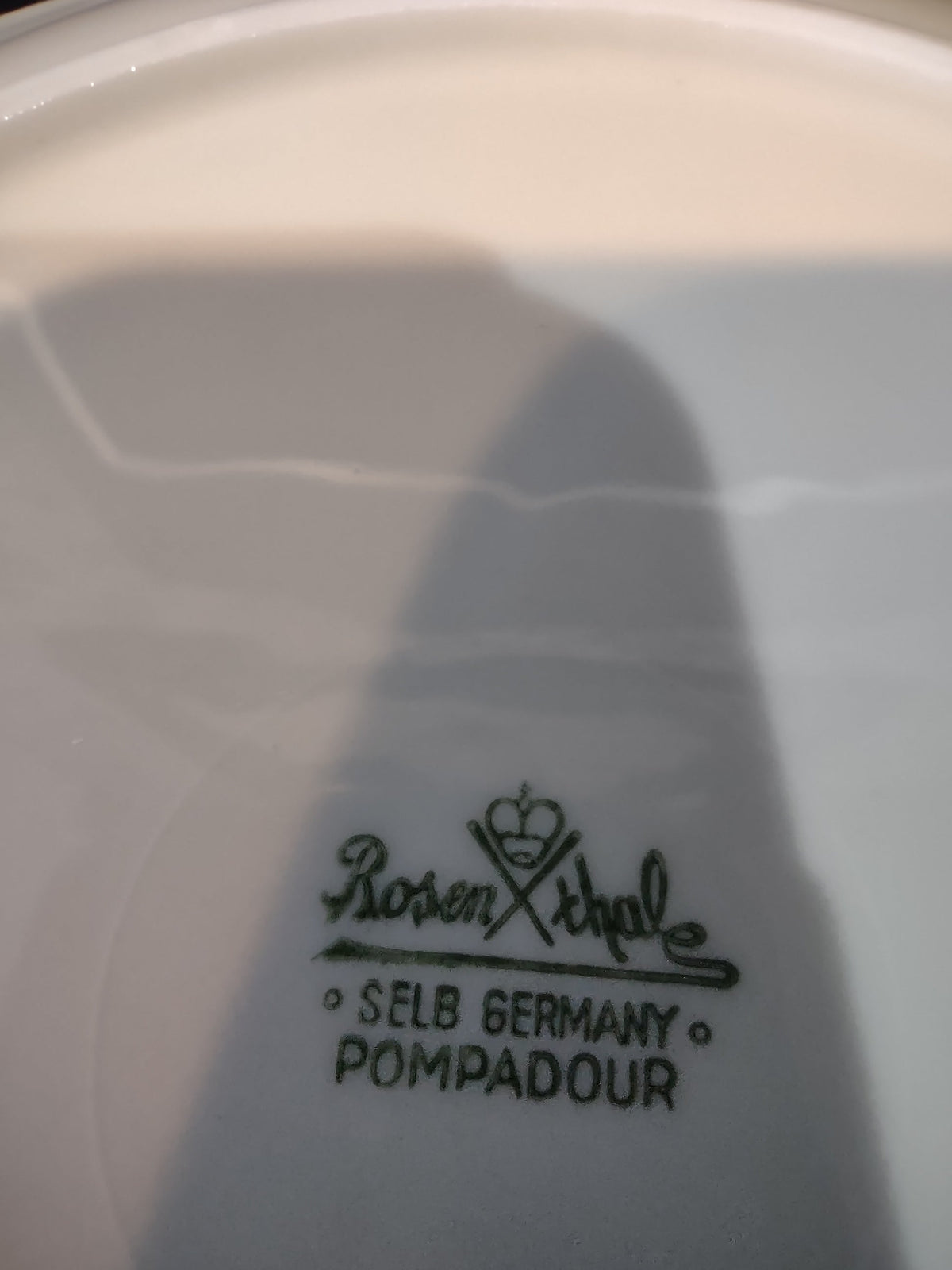 Rosenthal Pompadour plate with ruler showing 7.5 inch diameter