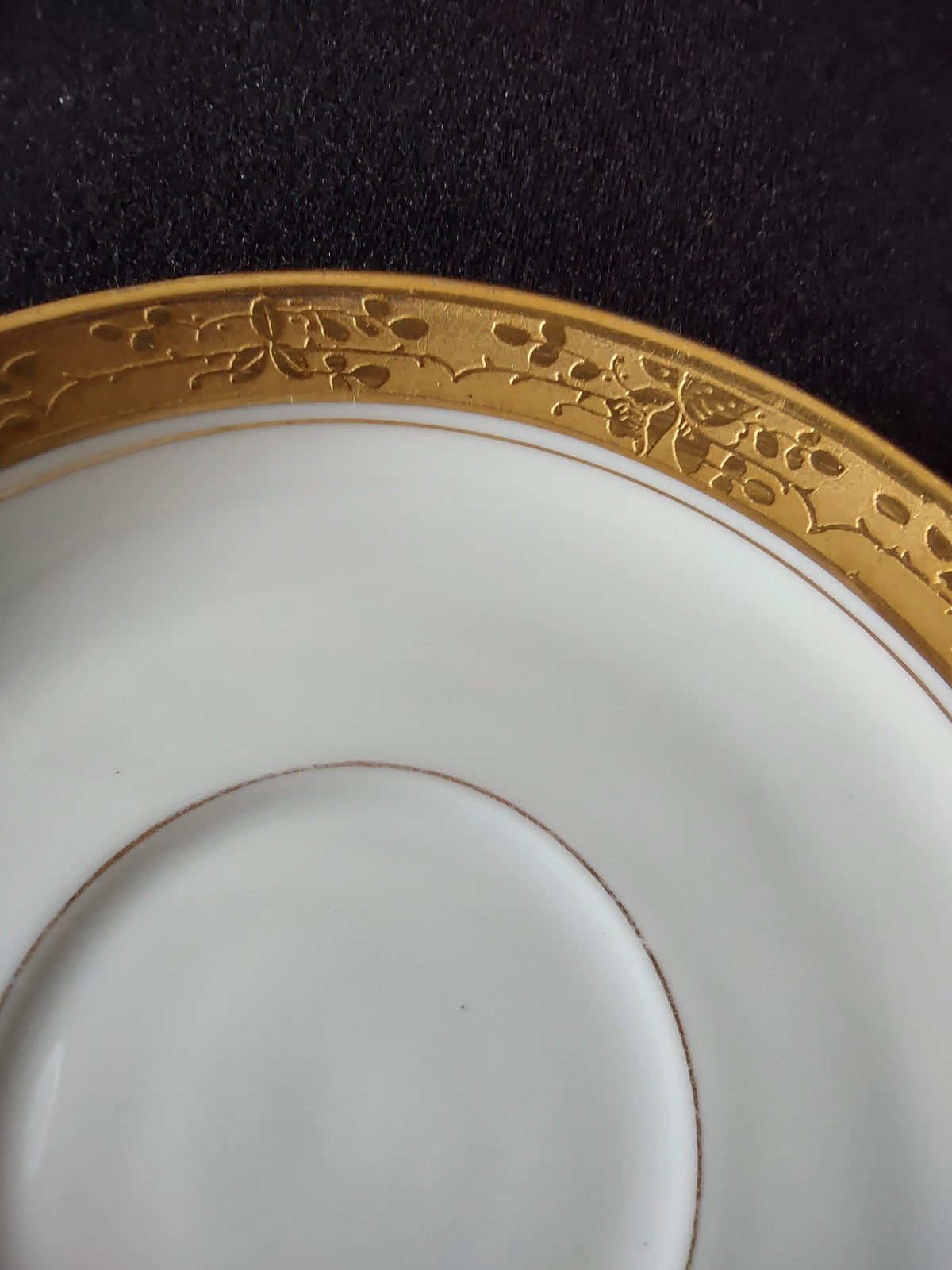 Back of saucer showing plain white undecorated base