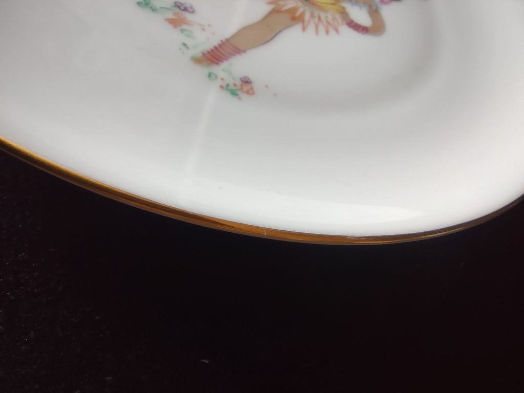 Limoges plate ruler showing approximately 6 inch diameter