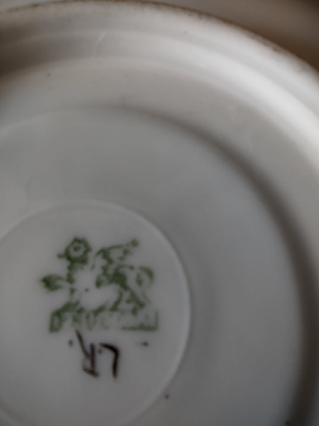Interior of cup showing orange banded rim