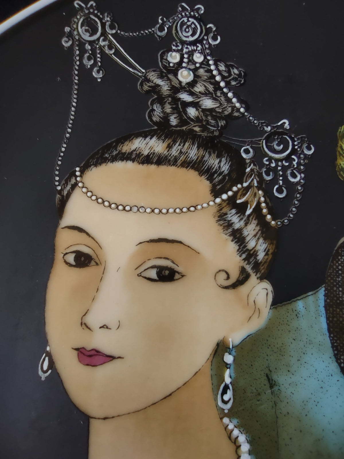 Detail of lower portion showing woman's dress and pearl necklace