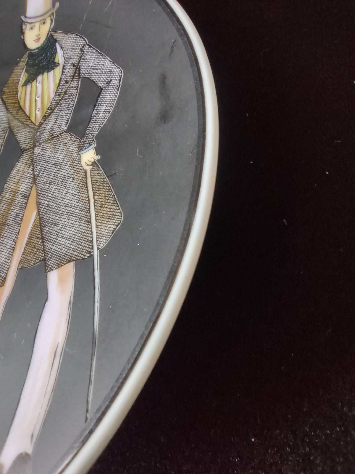 Side angle showing scratches on black ground surface