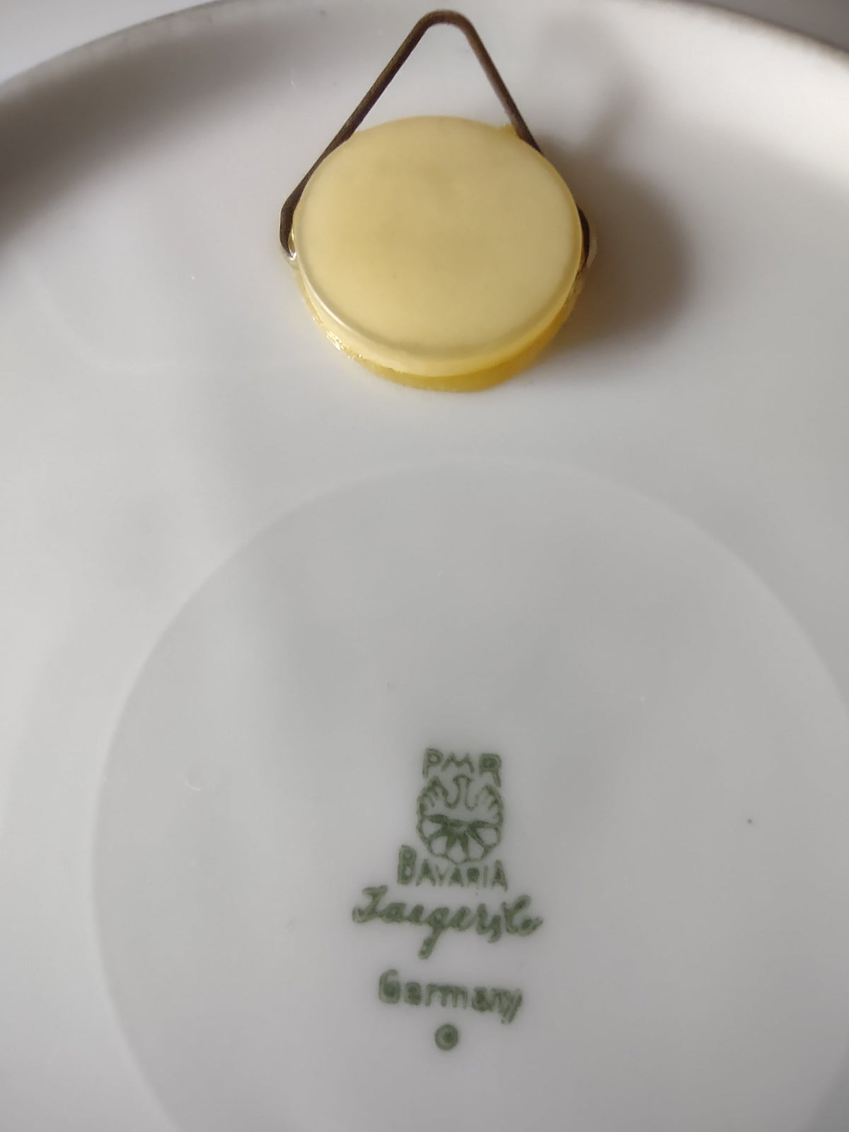 Plate with ruler showing approximately 8 inch diameter