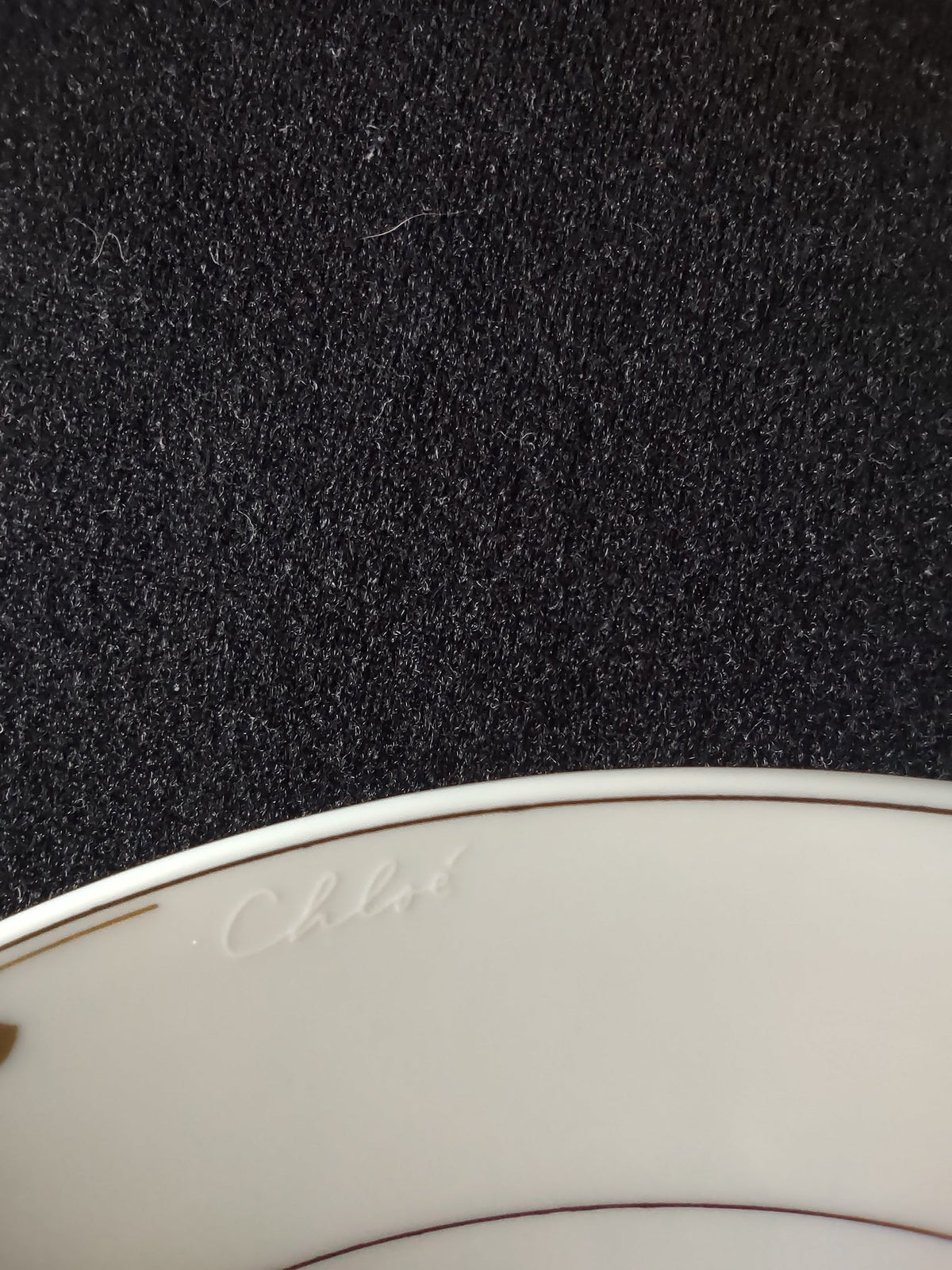 Hutschenreuther Chloe Paris plate - close-up gold dots and scalloped rim