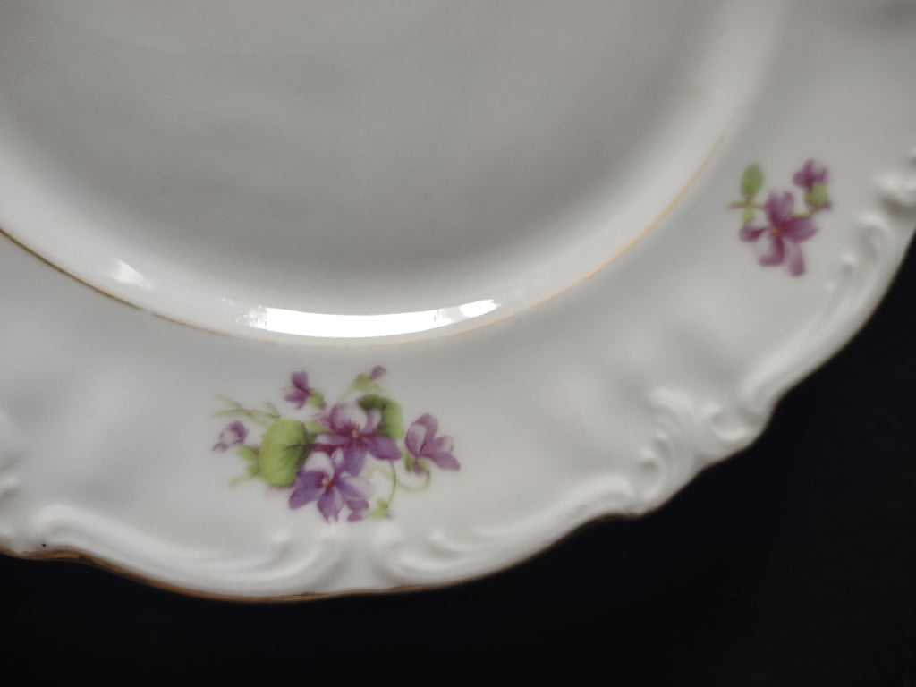 Winterling Germany violet plate - close-up of embossed border with scattered violet sprigs and gold rim