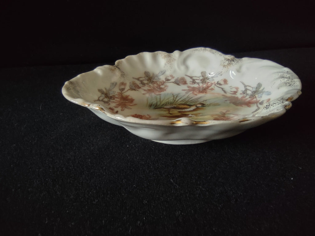 Triobad China Austria scalloped bon bon dish - angled side view showing depth and scalloped form