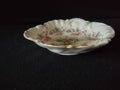 Triobad China Austria scalloped bon bon dish - angled side view showing depth and scalloped form