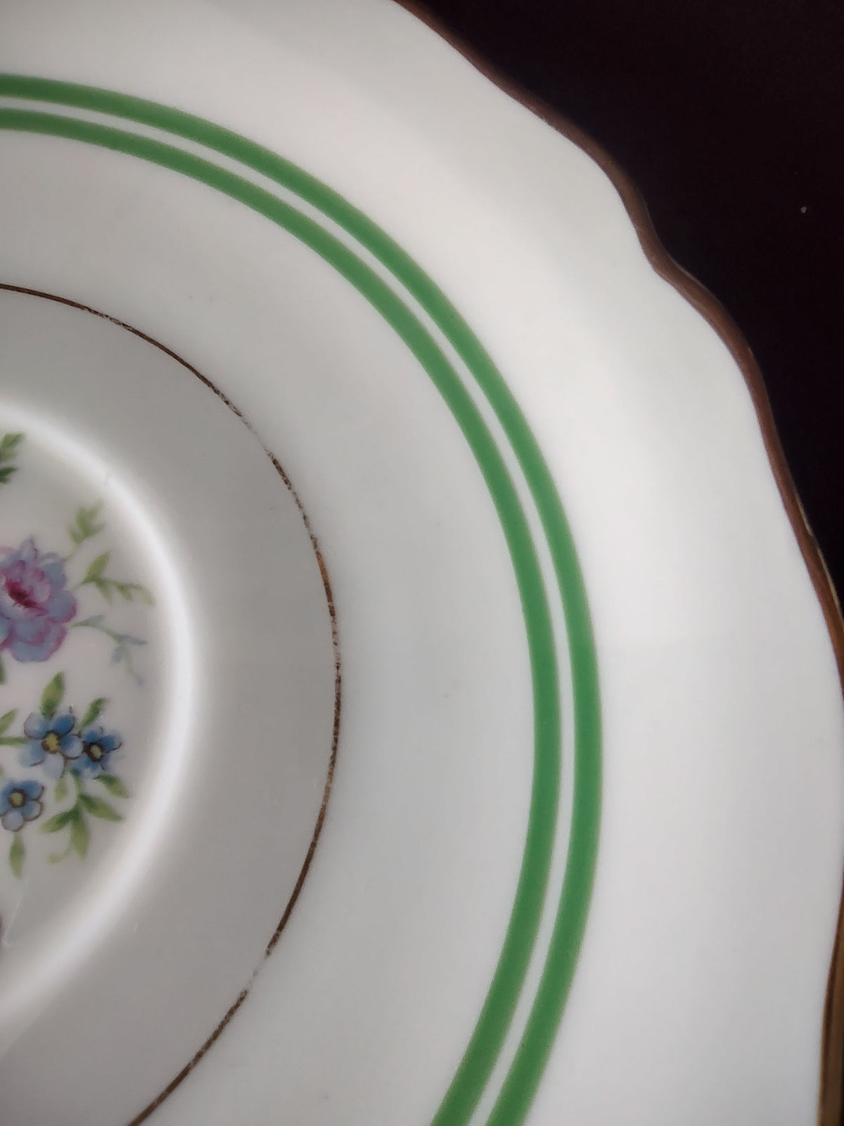 Hutschenreuther Murillo cup - side view showing fluted form, scroll handle and floral sprig
