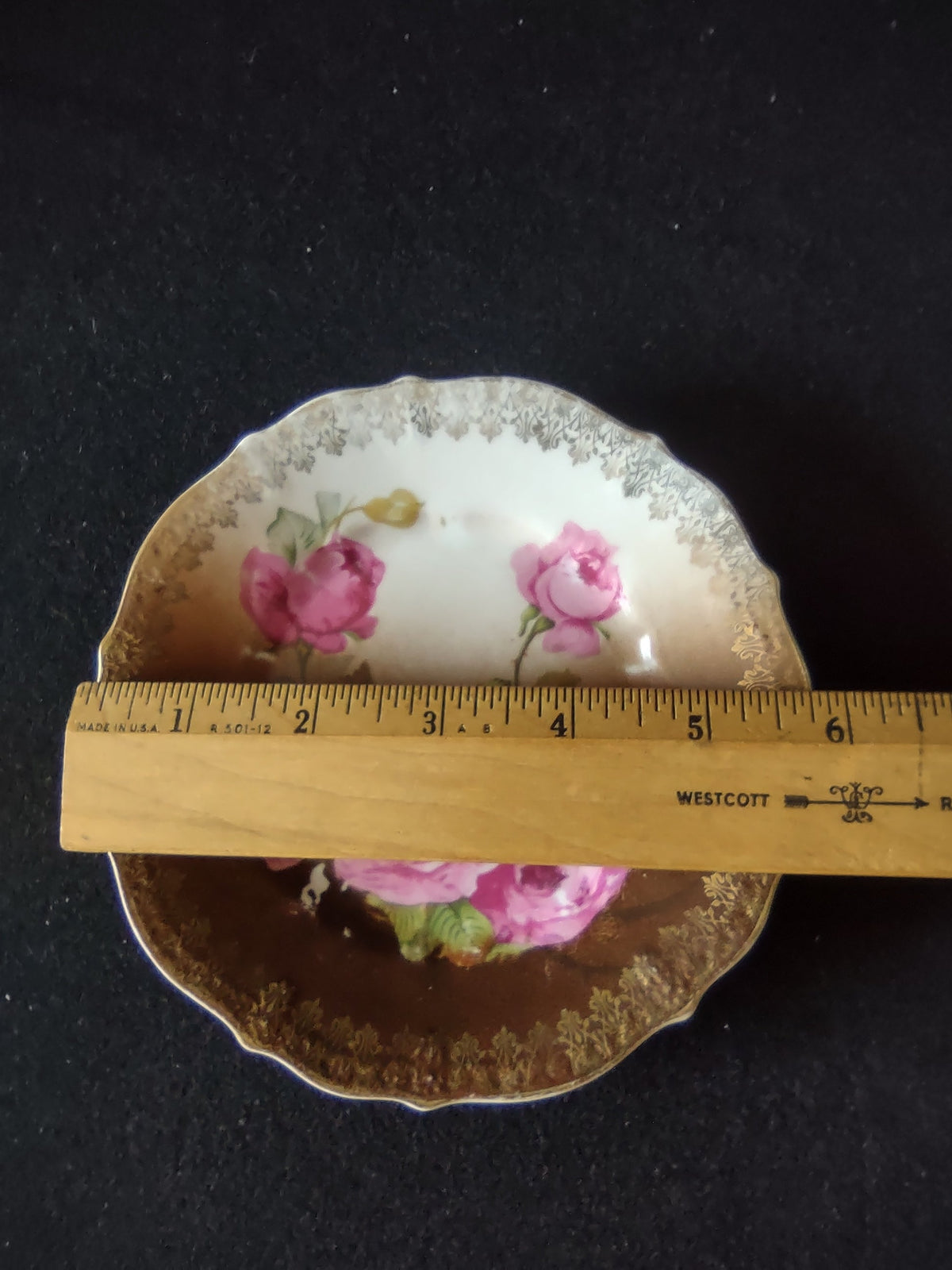 C.T. Carl Tielsch bowl - close-up of large pink magenta cabbage roses with green leaves