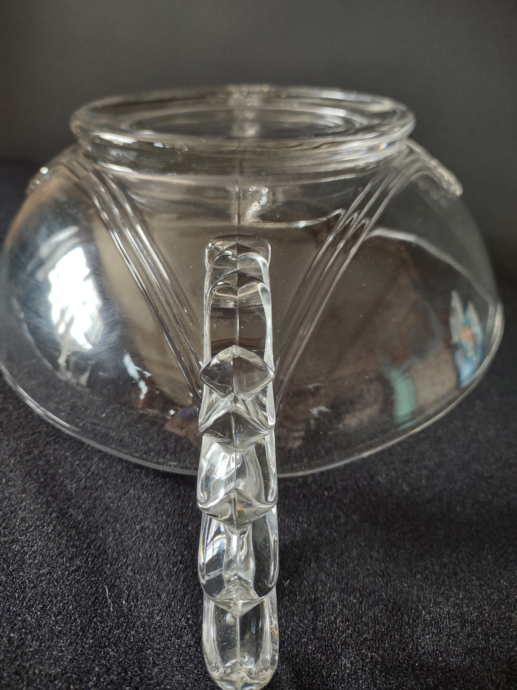 Bottom/base view of pressed glass relish dish showing plain flat foot rim