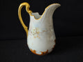 Vintage miniature porcelain creamer pitcher - front view with ruler showing approximately 4 inch height