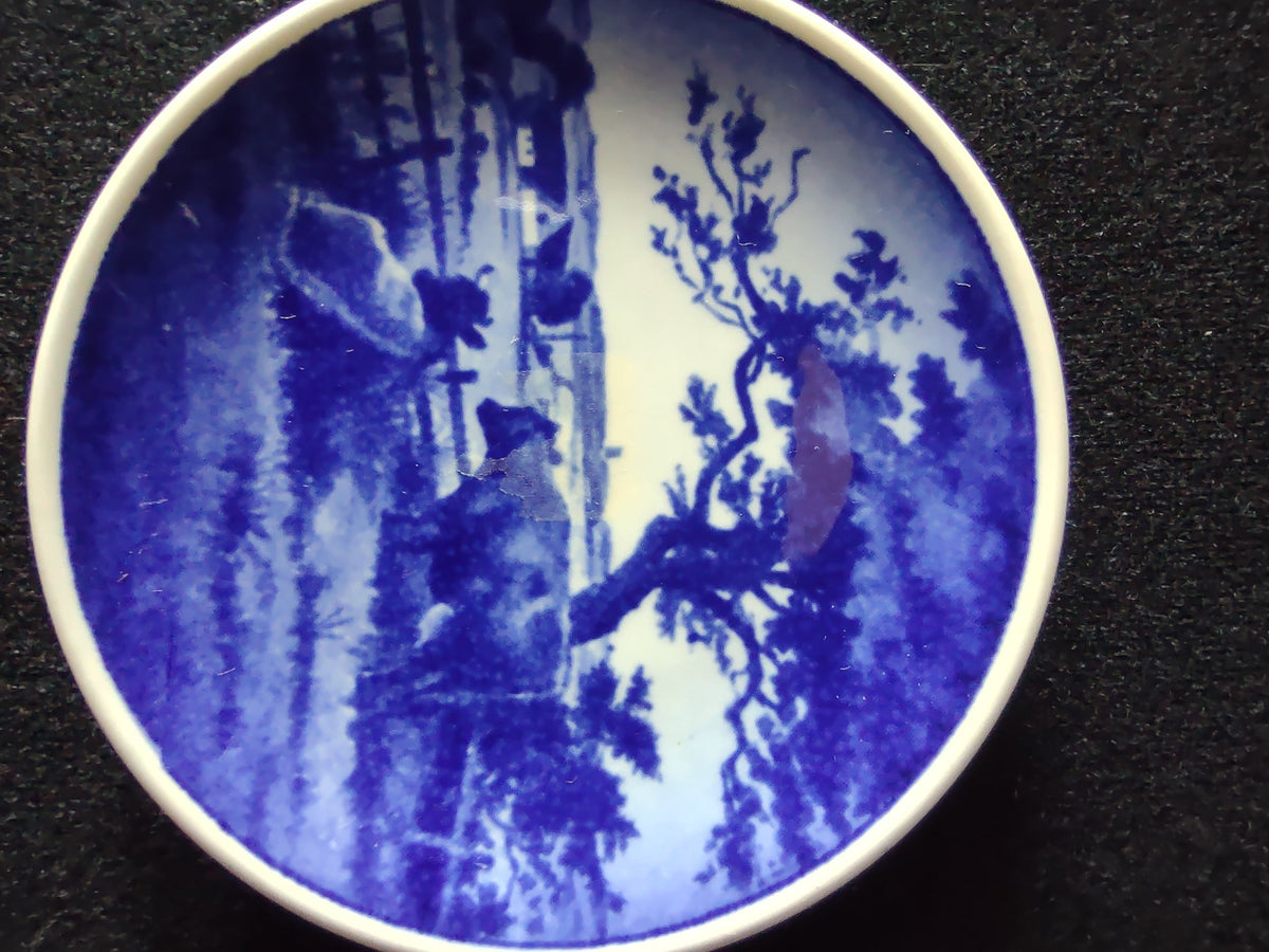 Royal Copenhagen mini plate side profile showing shallow dish form and white unglazed rim