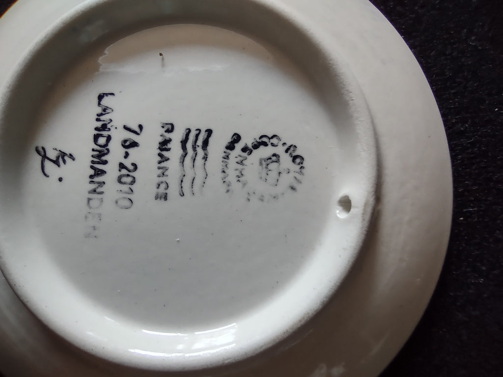 Royal Copenhagen mini plate group view showing all five plates together