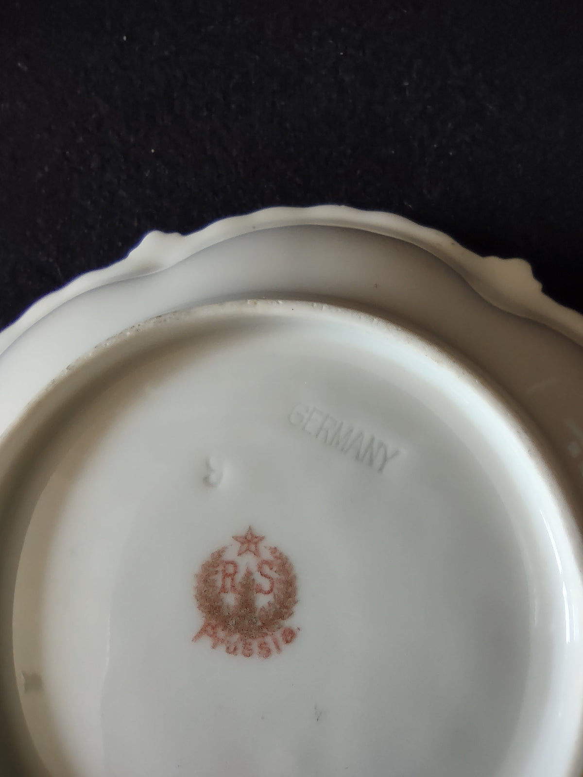 RS Prussia nappy dish overall top view showing full pattern — sage green rim shading to off-white center with dogwood sprays