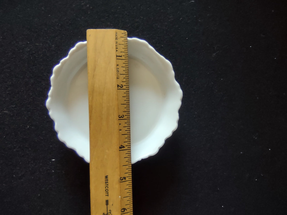 Meissen nappy dish angled side view showing shallow bowl profile and scalloped rim