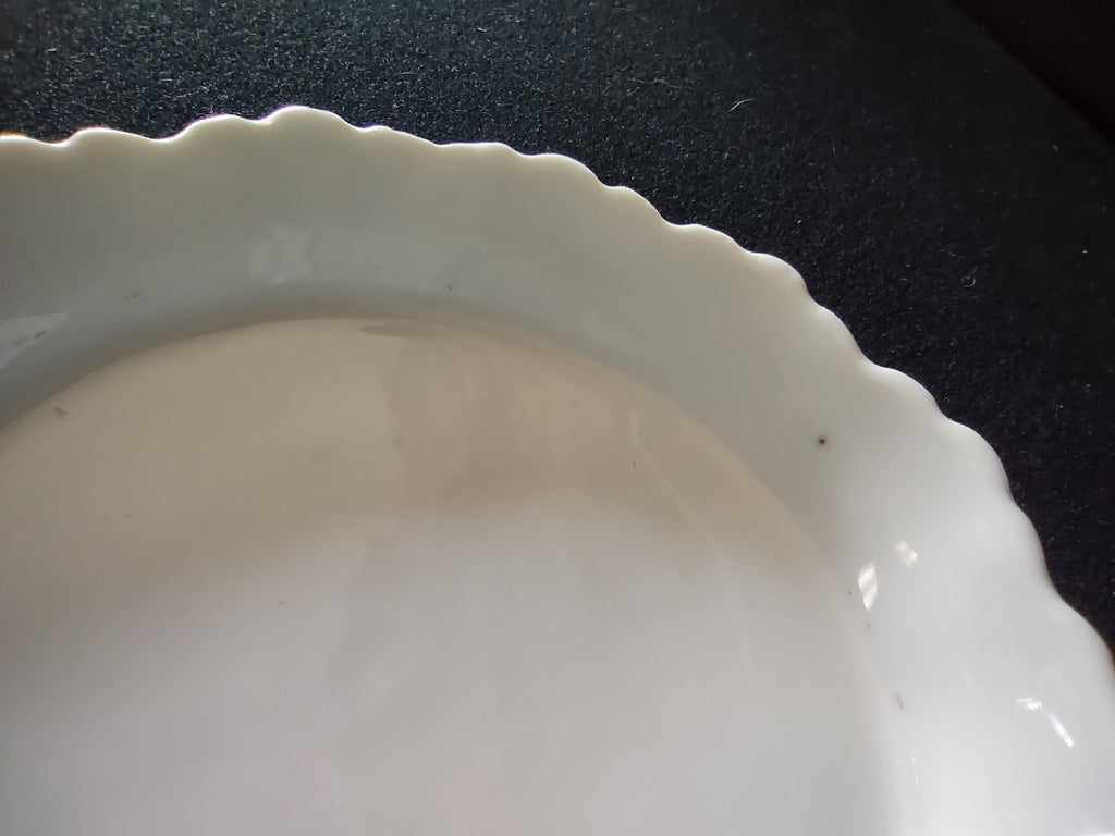 Meissen nappy dish close-up of scalloped ruffled rim detail showing pure white glaze