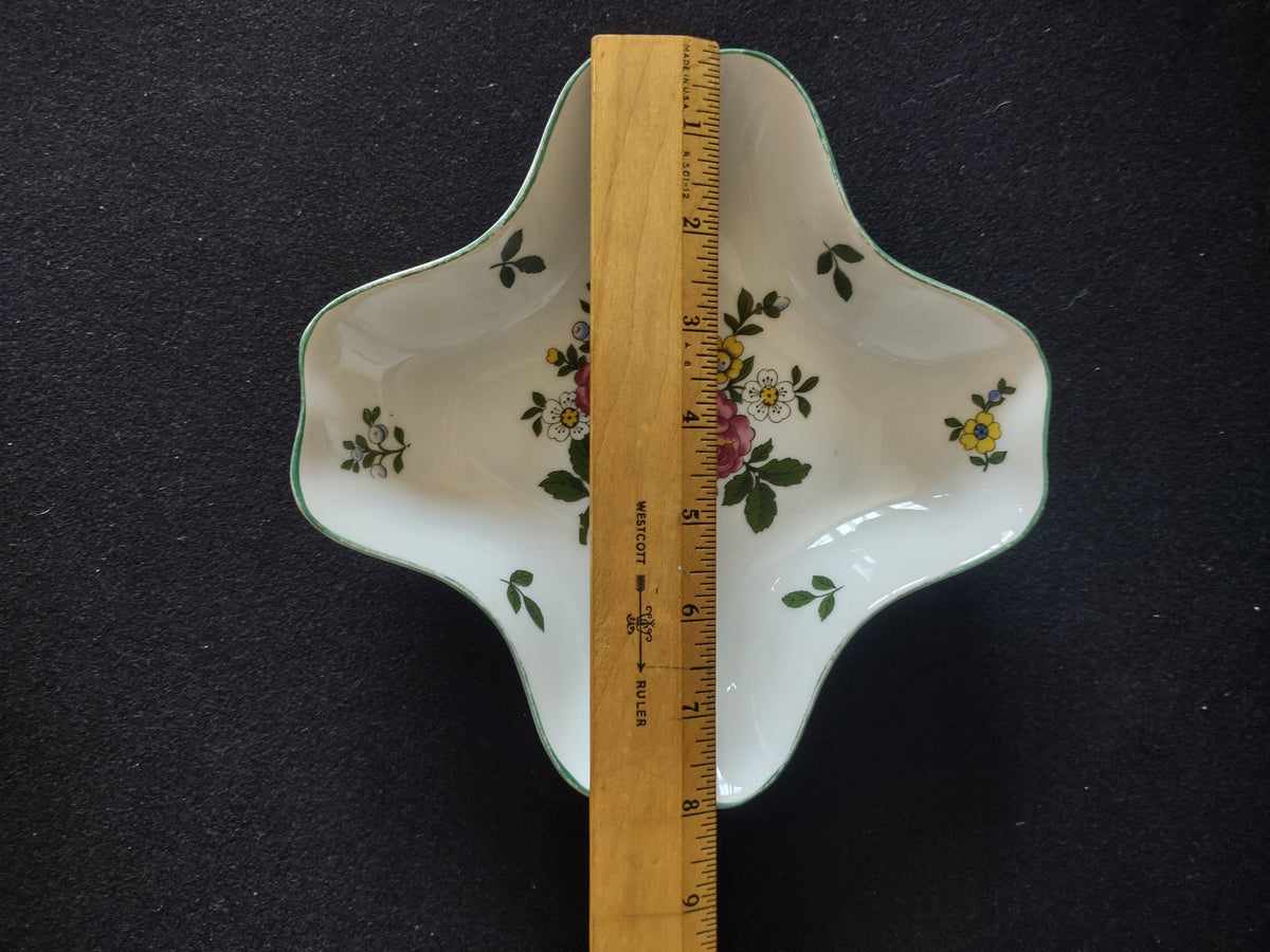 Royal Tettau candy dish angled view showing wavy quatrefoil rim profile and depth of the shallow bowl