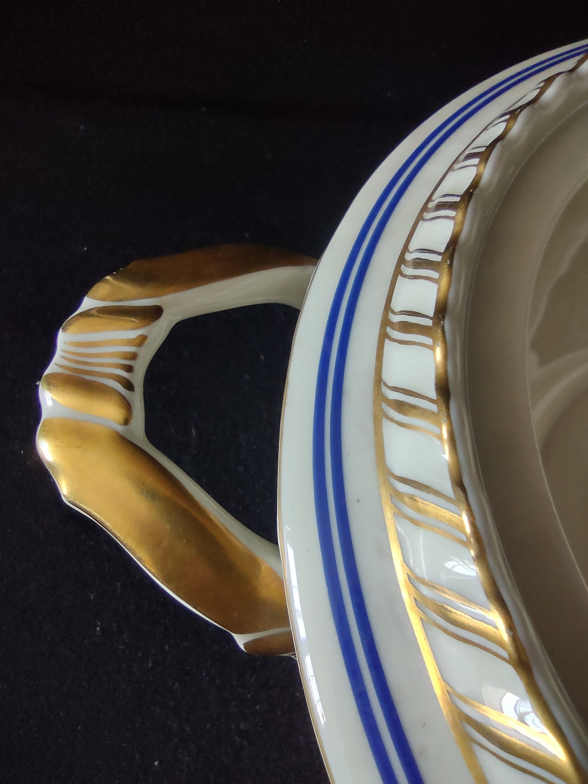 Limoges covered serving bowl overall top-down view without lid showing both gold handles double cobalt blue bands and gilt rope-twist rim border