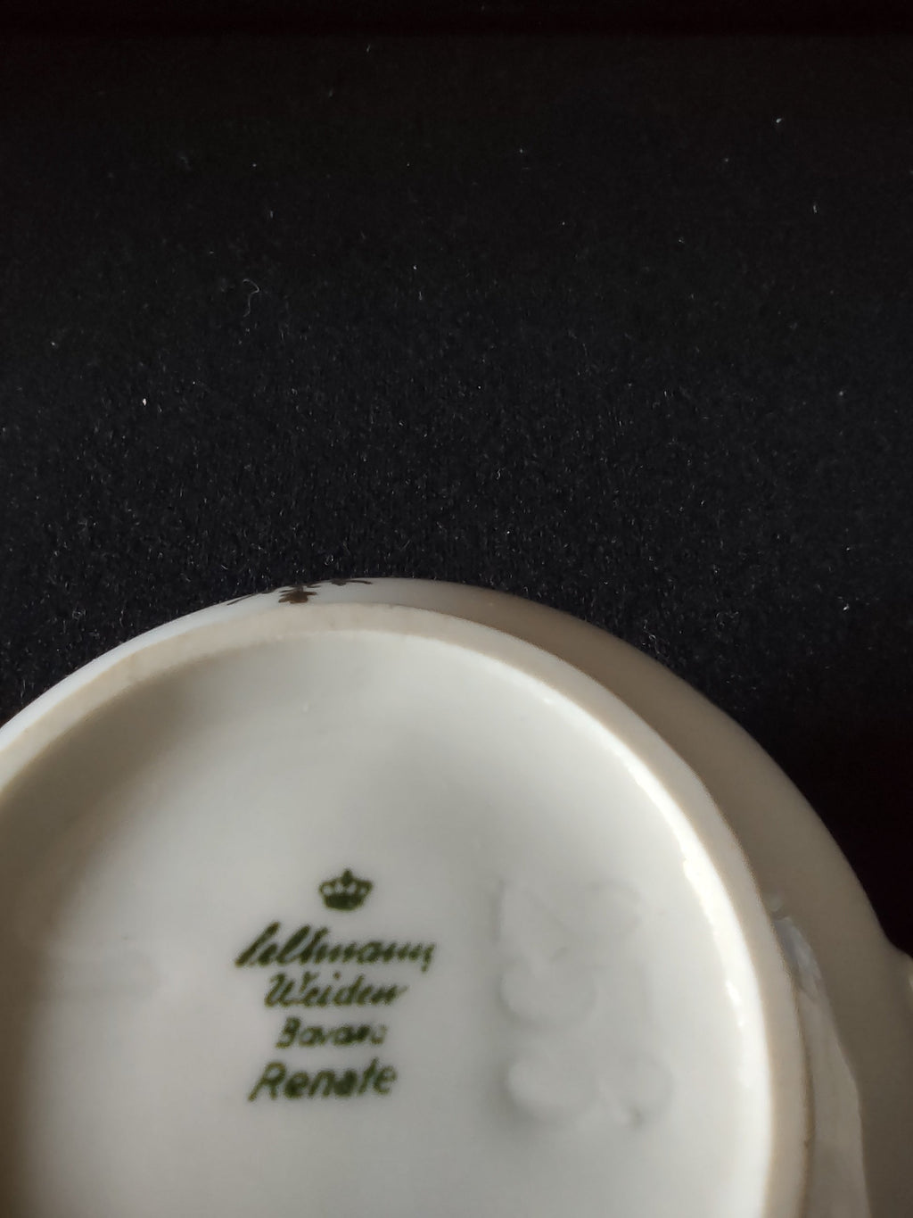 Seltmann Weiden Renate creamer opposite side close-up showing gold foliate sprigs fleur-de-lis motifs and gold foot ring line