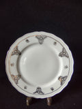 Vintage Seltmann Weiden Bavaria Renate pattern plate top view showing dark olive-gold trellis cartouches acanthus scrolls fleur-de-lis and scattered gold sprigs on embossed bead rim
