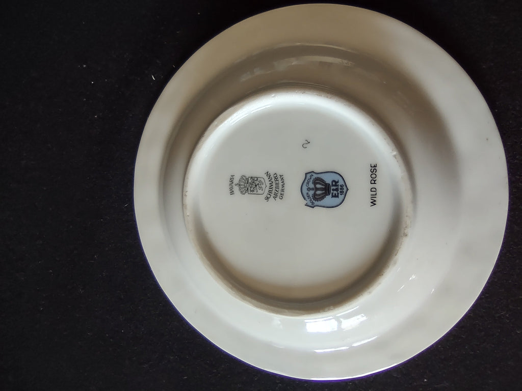 Schumann Arzberg Bavaria Wild Rose plate full base view showing backstamp Bavaria Schumann Arzberg Germany crown lion crest and Golden Crown E&R 1886 importer shield mark and Wild Rose pattern name