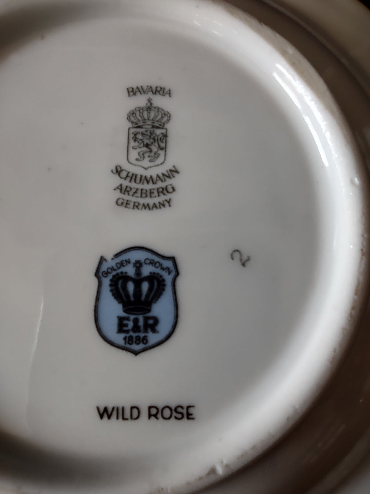 Schumann Arzberg Wild Rose plate close-up of backstamp showing Bavaria Schumann Arzberg Germany crown crest Golden Crown E&R 1886 shield mark and Wild Rose pattern text clearly readable