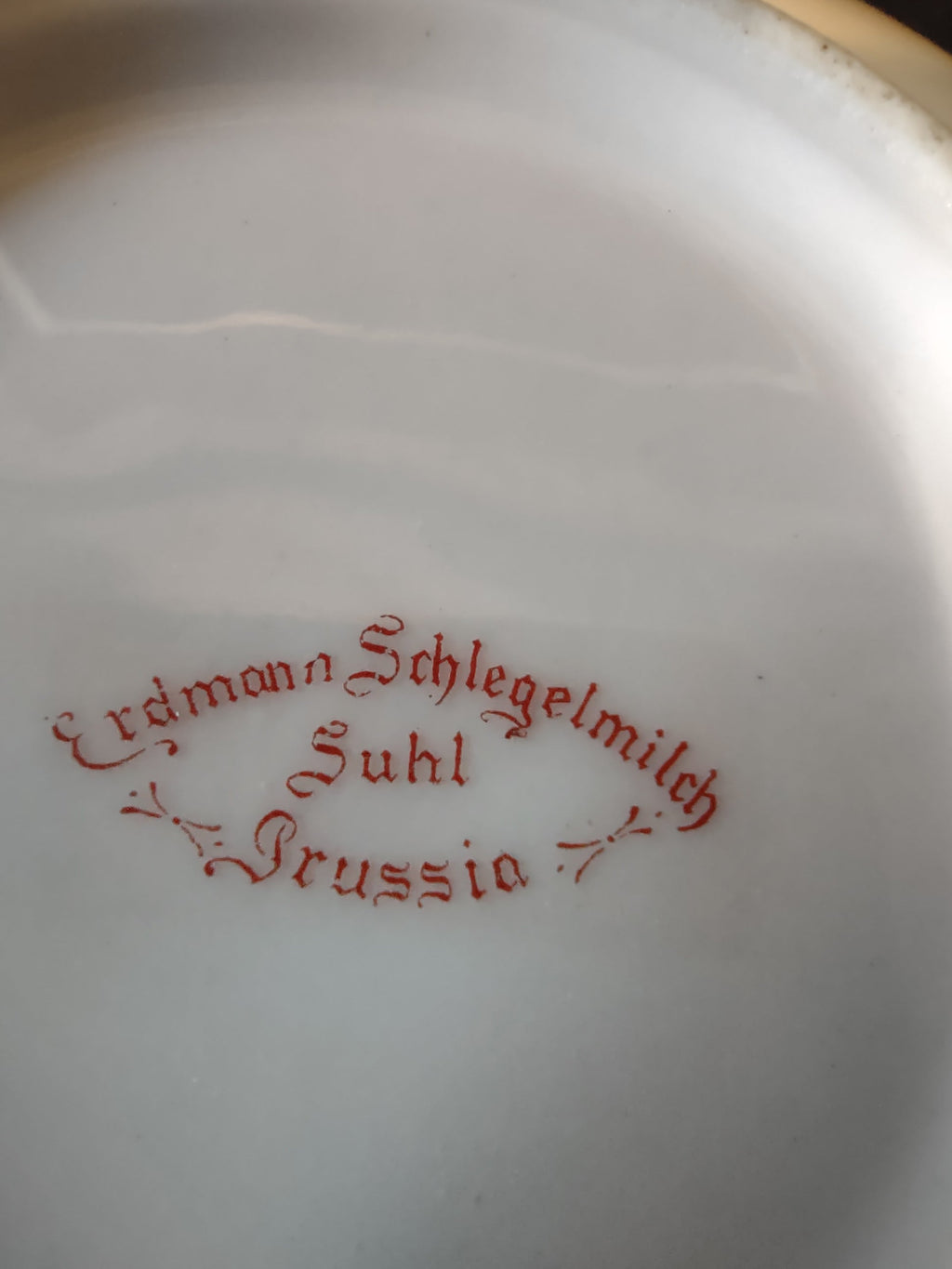 C Tielsch Altwasser plate backstamp close-up showing red diamond lozenge mark with C Tielsch Altwasser Silesia Germany text