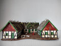 Vintage Heljan HO scale farmstead complex - front view with three half-timbered buildings