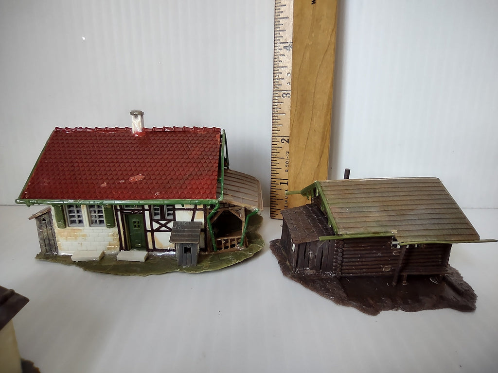 Faller HO scale half-timbered farmhouse and log barn with ruler for scale